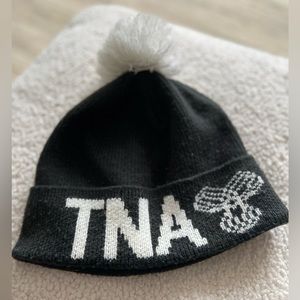 TNA toque